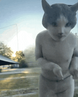 a statue of a man with a cat 's head on it