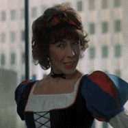 a woman in a snow white costume is smiling for the camera