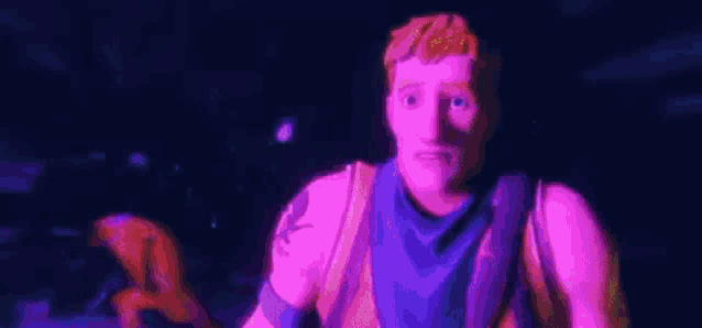 a man is standing in a dark room with a purple and pink background .