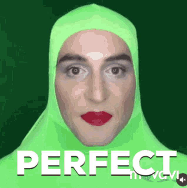a man wearing a green hood and red lipstick says perfect in white letters