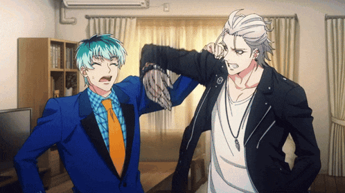 two anime characters are standing in a living room and one of them is wearing a blue suit and tie