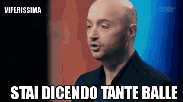 a bald man with the words stai dicendo tante balle written below him
