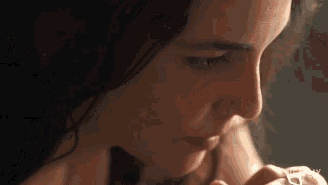 a close up of a woman 's face with the word liberty on the bottom left