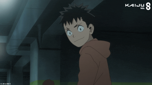 a cartoon of a boy giving a thumbs up with kaiju no. 8 in the background