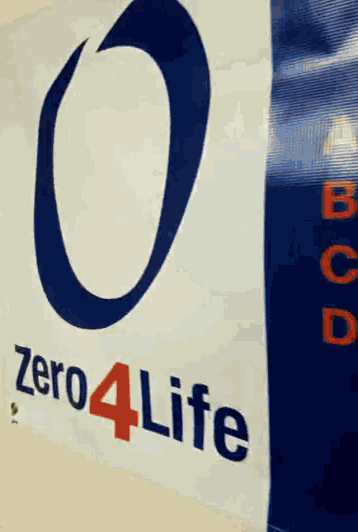 a blue and white sign says zero 4 life