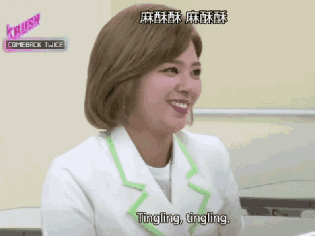 a woman in a white coat says tingling tingling in a foreign language