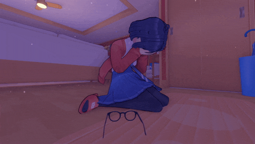 a girl is kneeling down with a pair of glasses on the floor in front of her