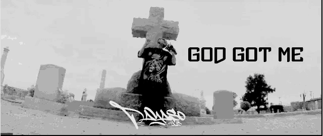 a black and white photo of a cemetery with the words god got me on the bottom