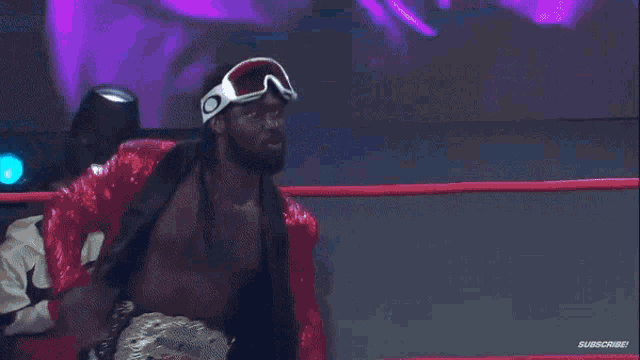 a person in a wrestling ring with the word fear on the bottom right