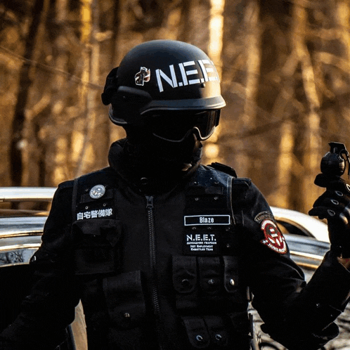a man wearing a helmet that says n.e.e.f.