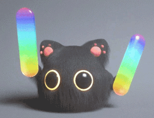 a black cat holding two rainbow colored lights