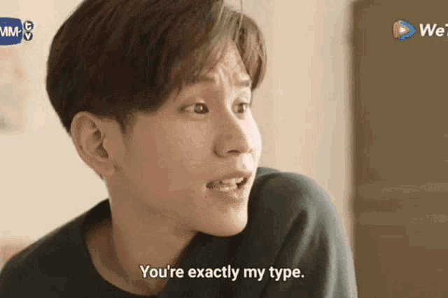 a close up of a man 's face with the words `` you 're exactly my type '' .