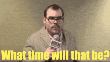 a man holding a microphone with the words " what time will that be " behind him