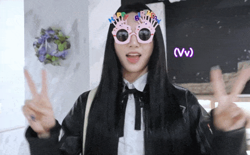 a woman wearing a pair of pink glasses that say happy birthday