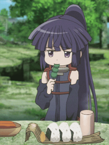 a girl with purple hair is sitting at a table eating rice balls