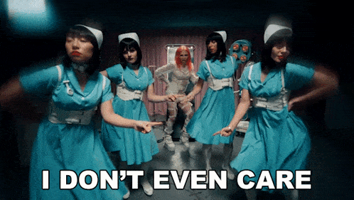 a group of nurses are dancing in a room with the words " i don 't even care "