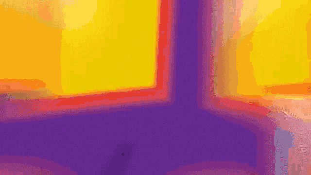 a close up of a person 's face with a purple and orange background