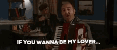 a man is playing an accordion and saying if you wanna be my lover .