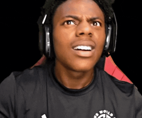 a young man wearing headphones and a shirt that says be world ready