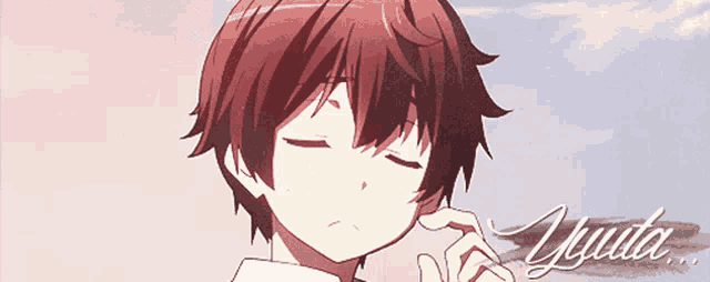 a drawing of a boy with red hair and the name yuuta on the bottom