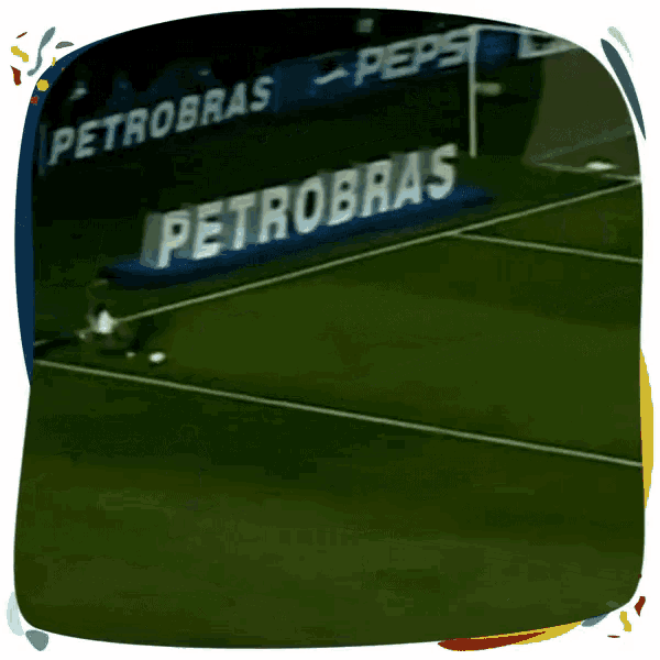 a soccer game is being played in front of a banner that says lg