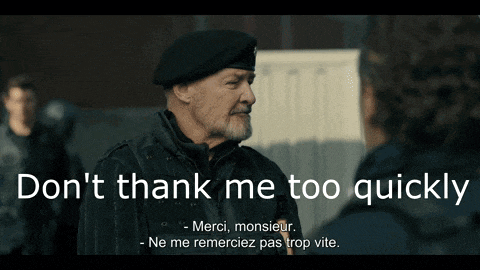 a man in a beret talks to another man with the words " don 't thank me too quickly "