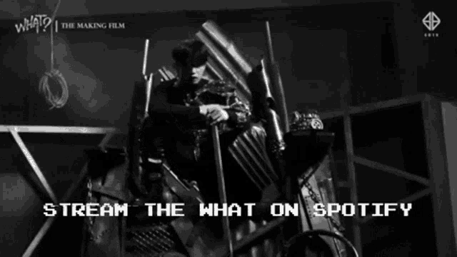 a black and white photo of a man sitting on a throne with the words " stream the what on spotify " above him