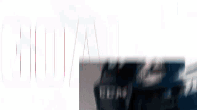 a blurry picture of a person 's face with a white background and red lines on it