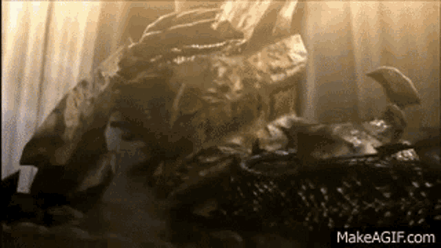 a close up of a statue of a dragon in a room .