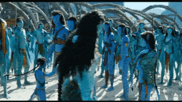 a group of avatar characters standing on the beach