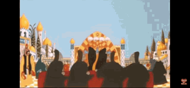 a group of people are sitting in front of a building with a red heart on the bottom