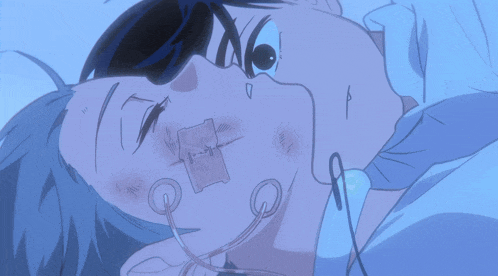 a close up of a person 's face with a needle in their mouth