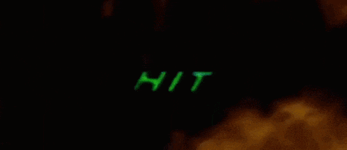 the word hit is glowing in green on a black background