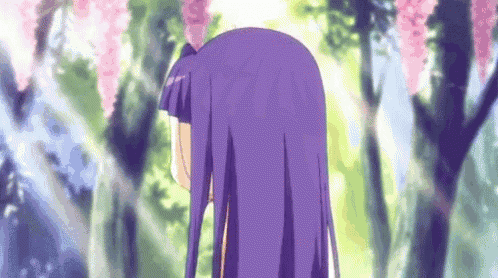 a girl with purple hair is standing in a forest with cherry blossom trees .