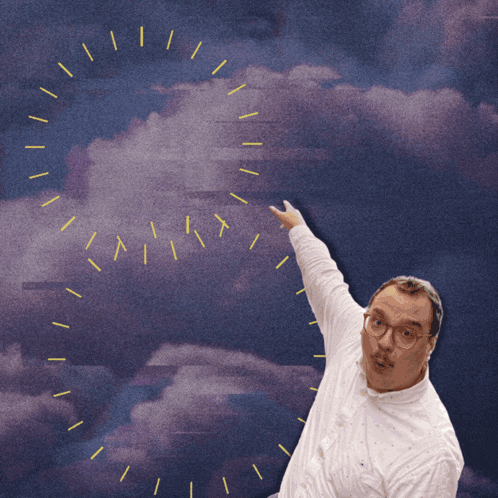 a man in a white shirt points to a cloudy sky with a clock in the background