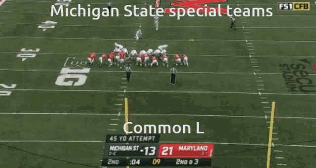 a football game between michigan st. and maryland