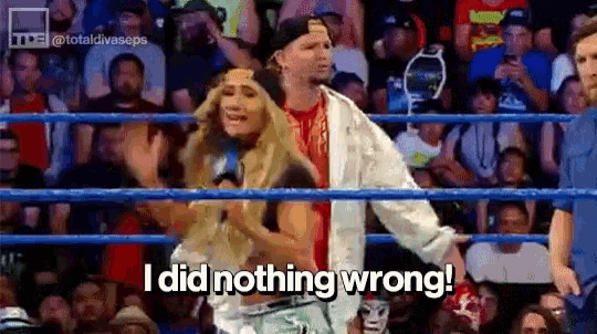 a man and a woman are in a wrestling ring and the woman says i did nothing wrong .
