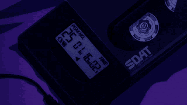 a dat device displays the time as 16:02