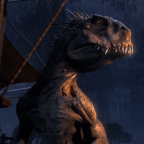 a close up of a dinosaur 's face with sharp teeth