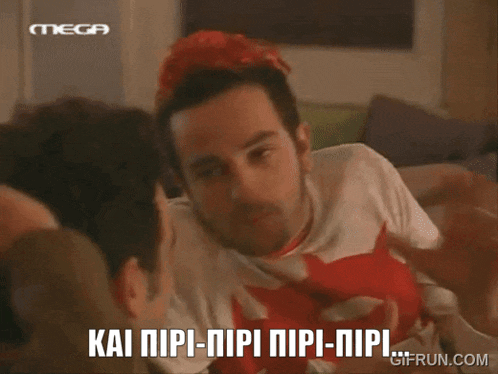 a man with red hair is talking to another man with the words kai npi-npi npi-npi