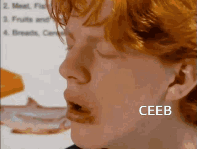 a close up of a woman 's face with the word ceeb written on her ear