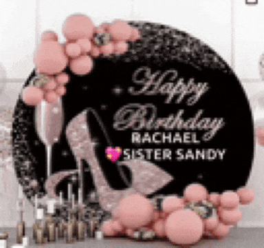 a sign that says `` happy birthday rachael sister sandy '' is sitting on a table .