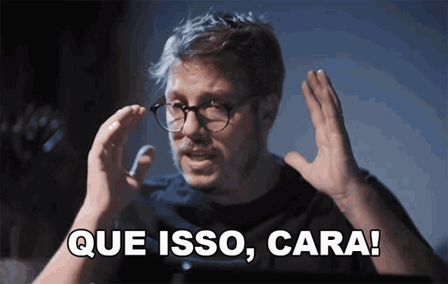 a man wearing glasses is making a funny face with que isso cara written below him