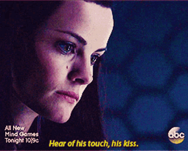 an advertisement for all new mind games shows a woman crying and says hear of his touch his kiss