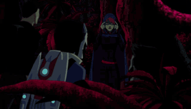 a woman in a blue cape is standing next to a man with a shield