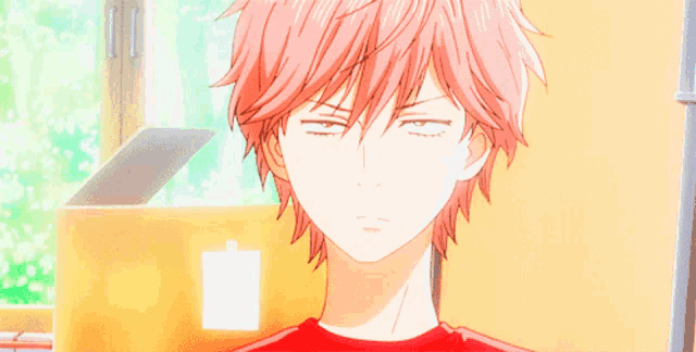 a man with pink hair and a red shirt is looking at a woman