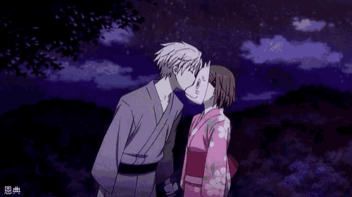 a cartoon of a man and woman kissing with chinese writing on the bottom