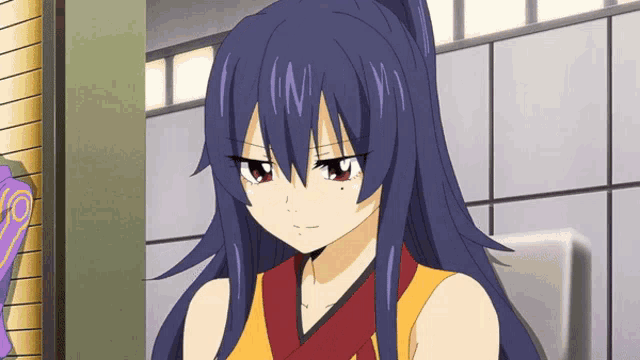 a girl with long purple hair is wearing a red and orange shirt