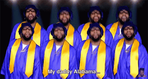 a group of men in graduation gowns are standing in a line and one of them says " my daddy alabama "