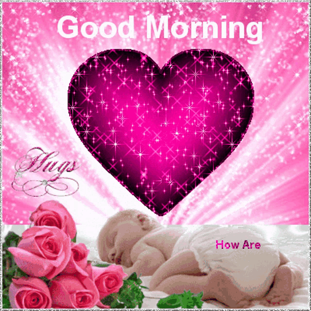 a baby in a diaper is sleeping next to a heart that says good morning